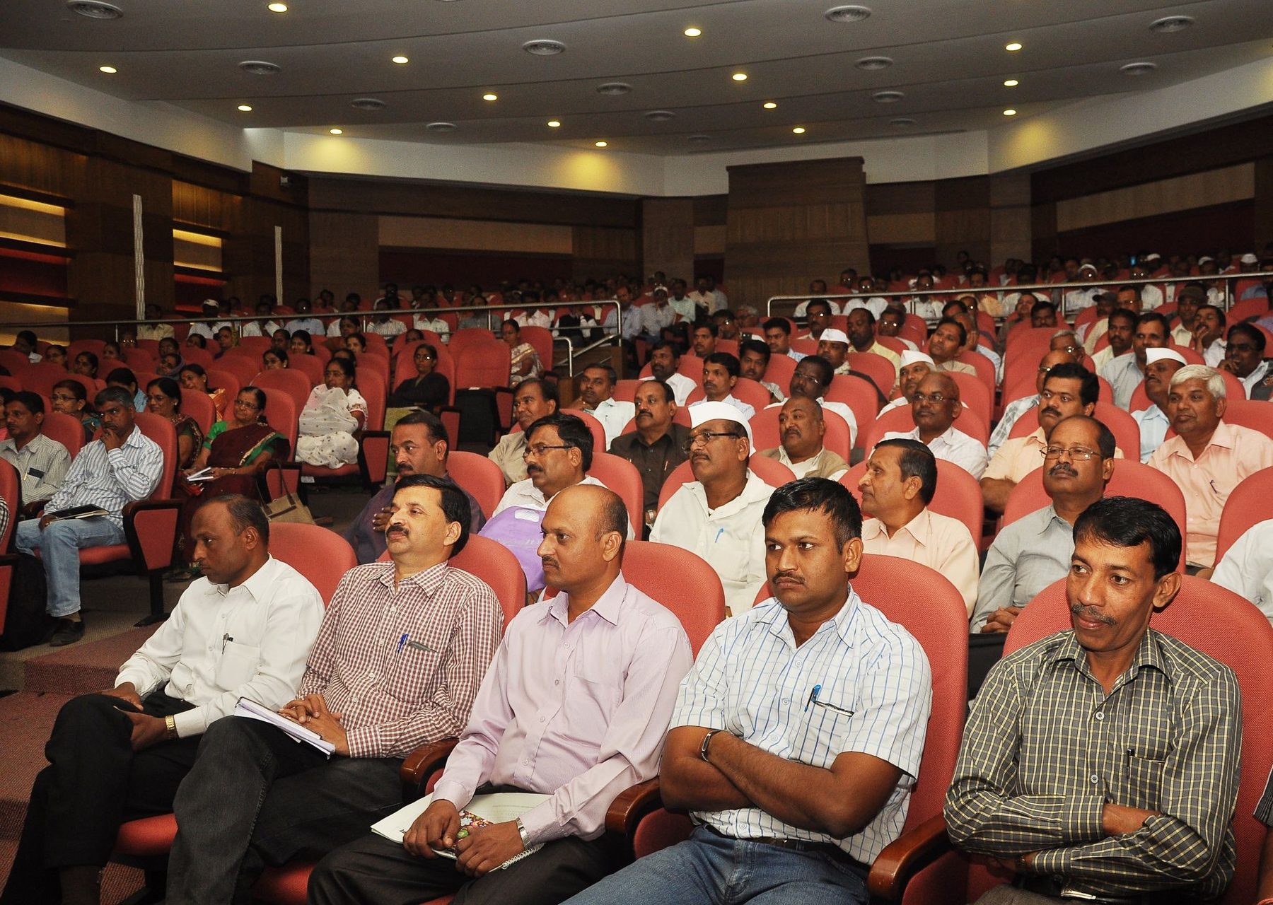 Corporate professionals attending a leadership and transformation workshop