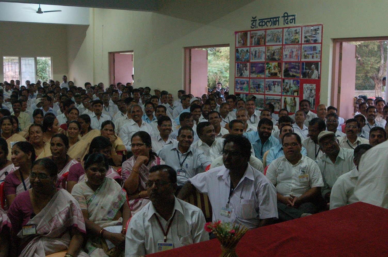 University auditorium filled with engaged students and faculty