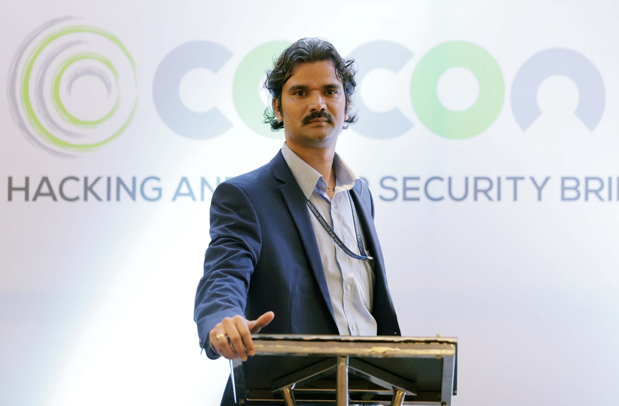 Santosh Talaghatti speaking at CoCon — Hacking & Security Briefing